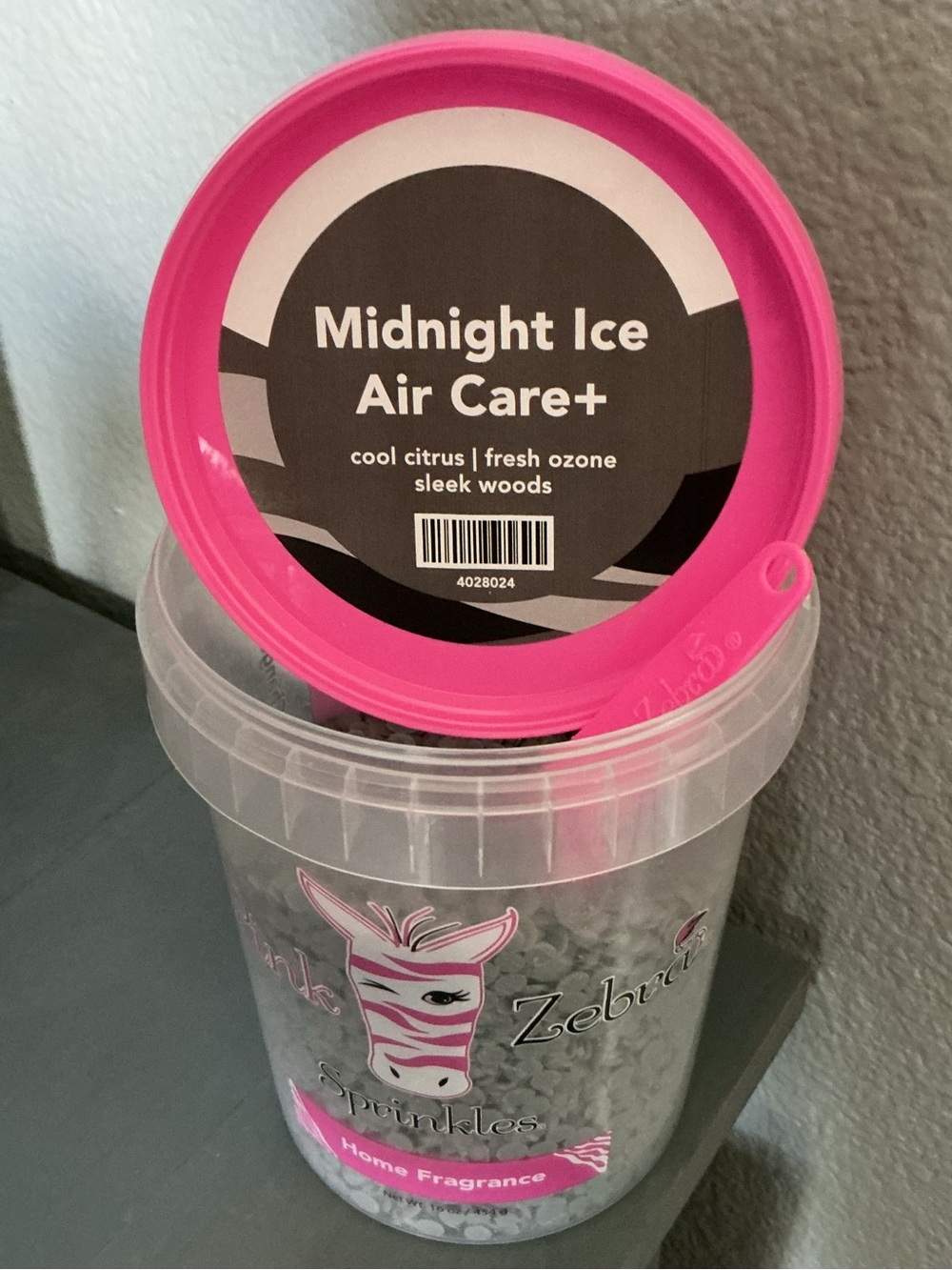 Midnight Ice Air Care+ Pink Zebra Odor Eliminating Wax Melts in a 4 oz blend bag